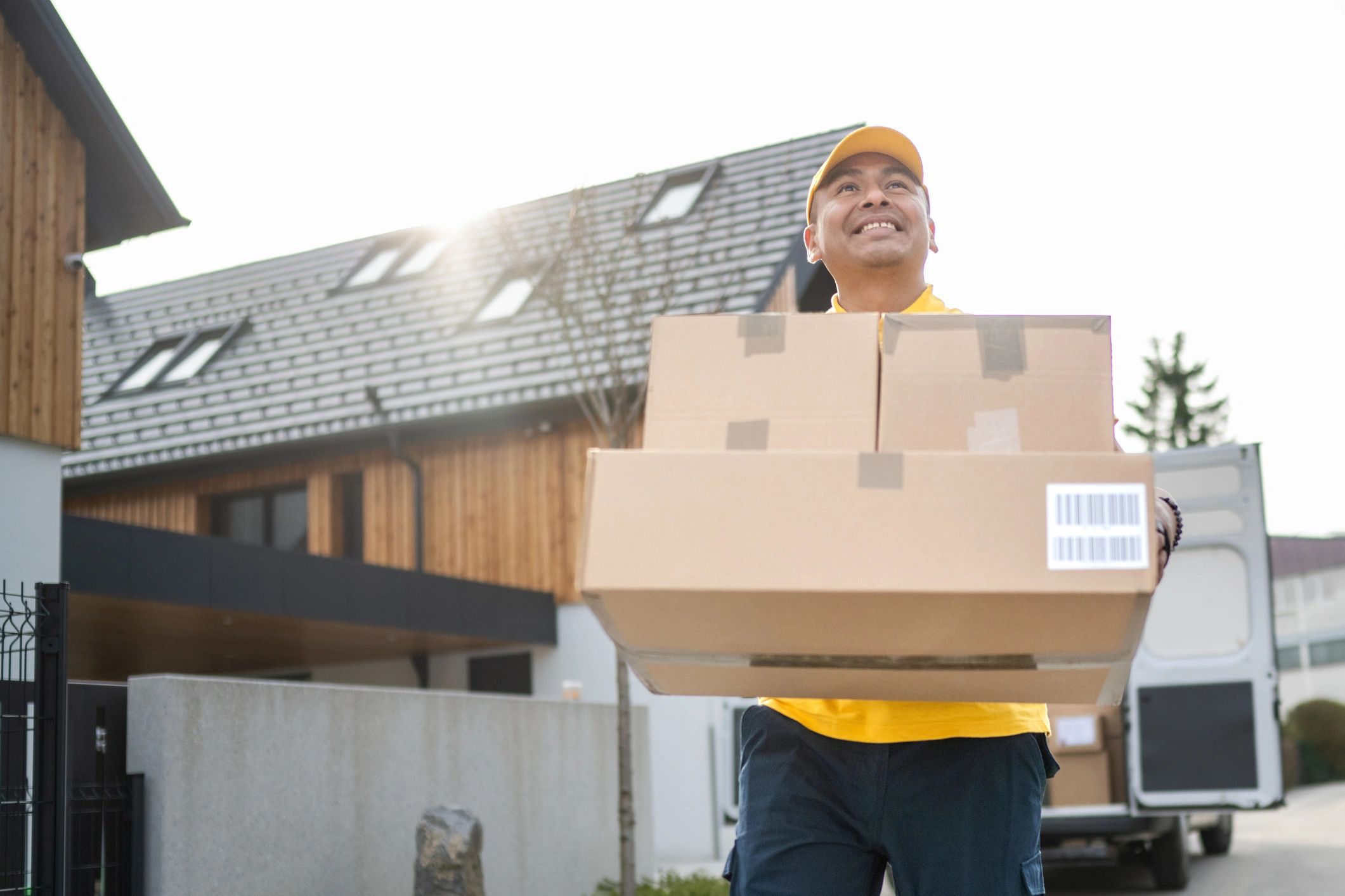 Courier holding packages ready for delivery